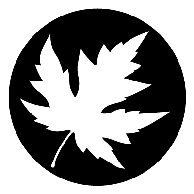 White silhouette of a multiple pointed leaf with pointed edges on a black circle gobo.